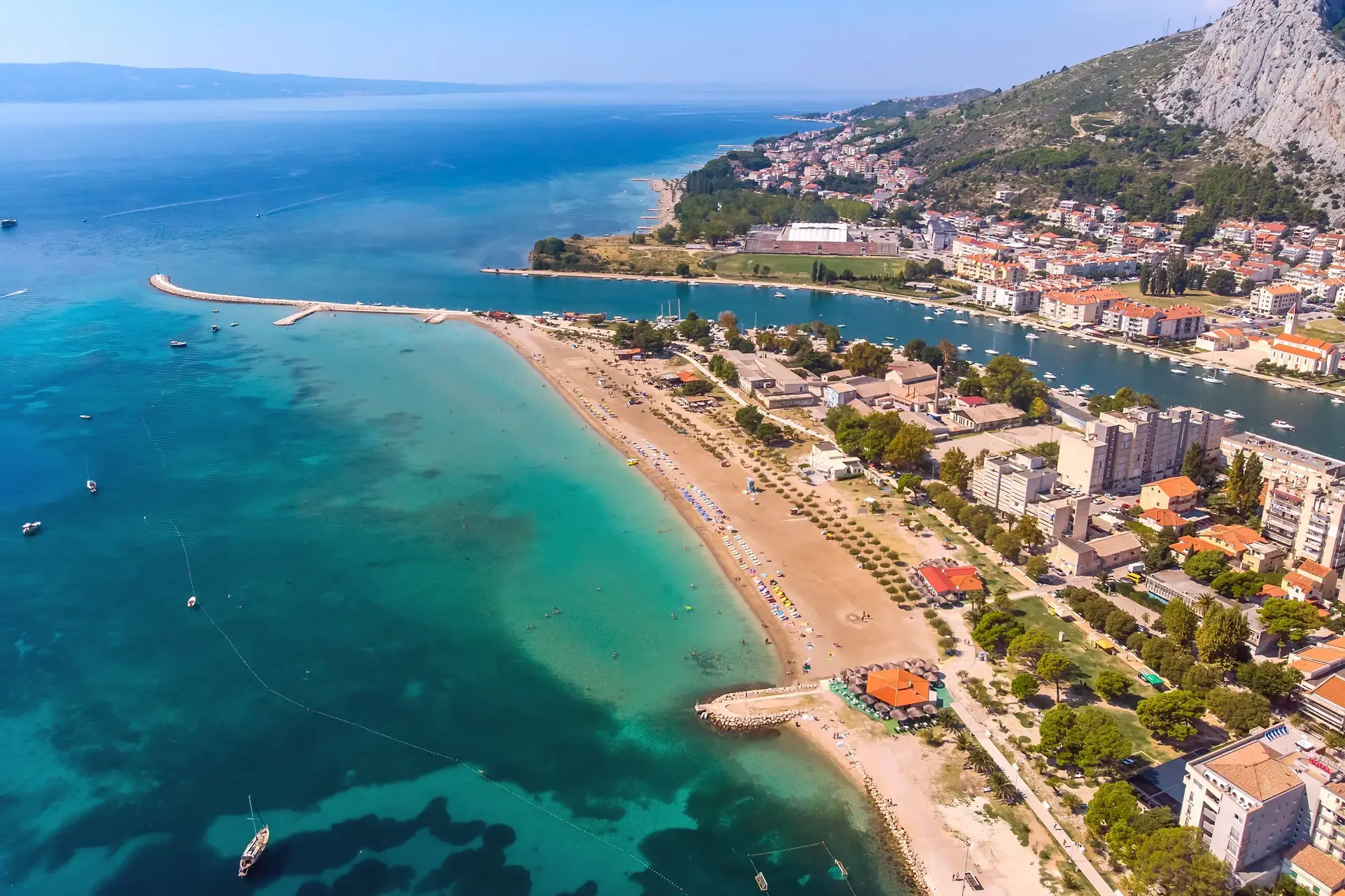 aerial view of a beach town and sea