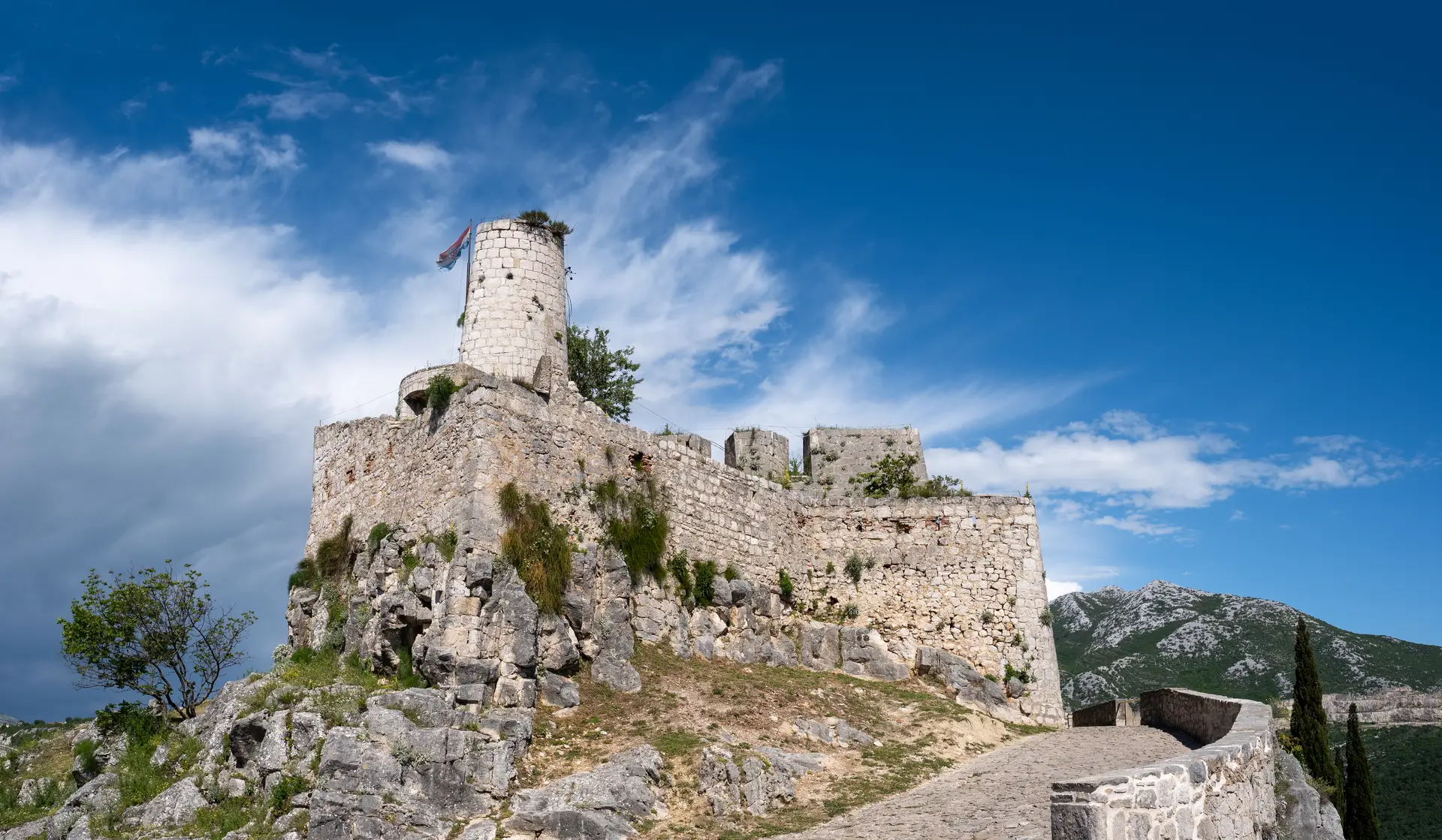 medieval fortress at a top of the hill
