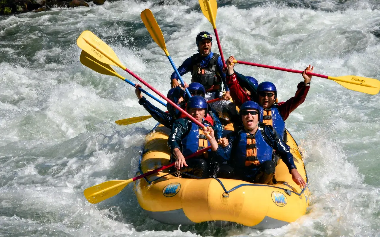 people in a boat rafting at the river cetina
