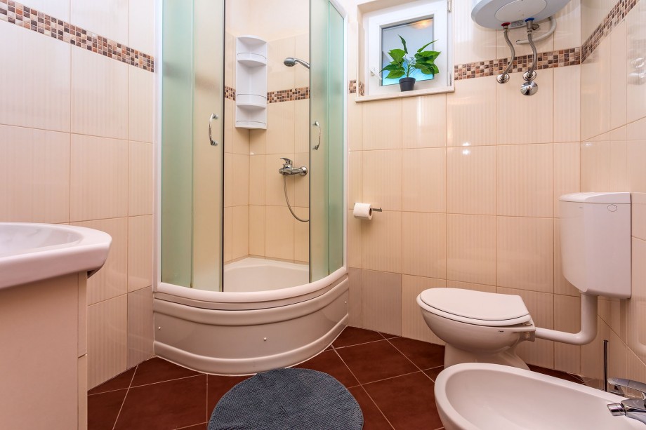 Bathroom with toilet, bidet and shower in AP1