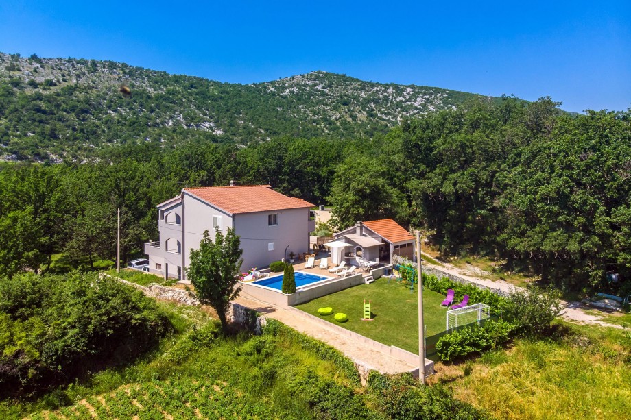 View on the  whole property and neighborhood from above