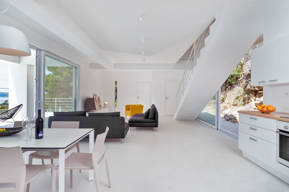 Fully equipped kitchen with dining and living area