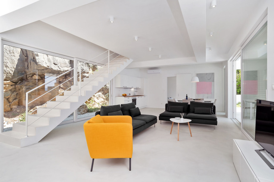 Fully equipped kitchen with dining and living area