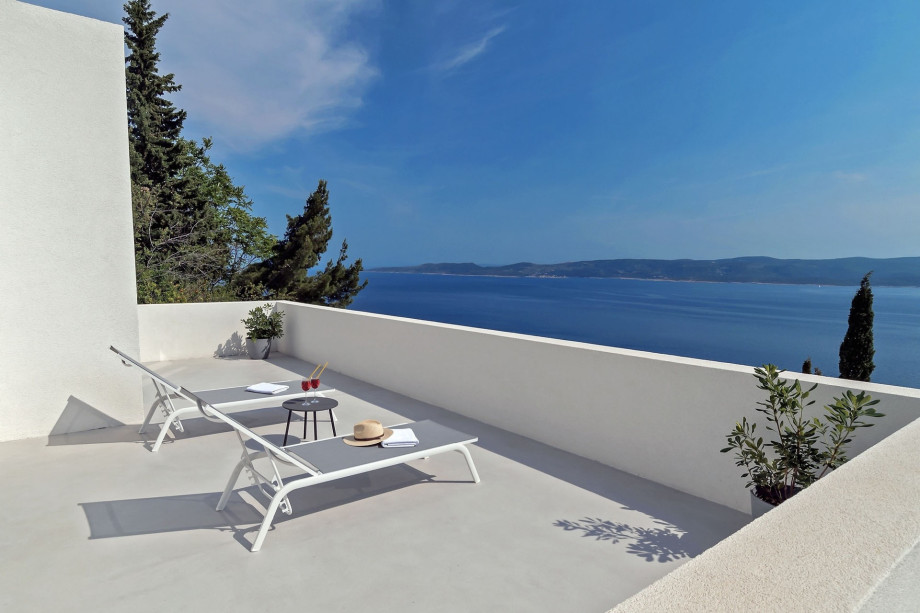 Terrace in front of the bedrooms on 2nd floor with outdoor furniture & sea view