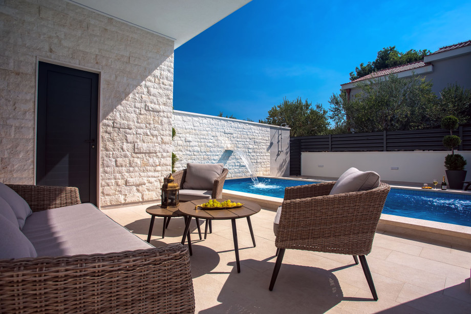 The pool area in front of the living area