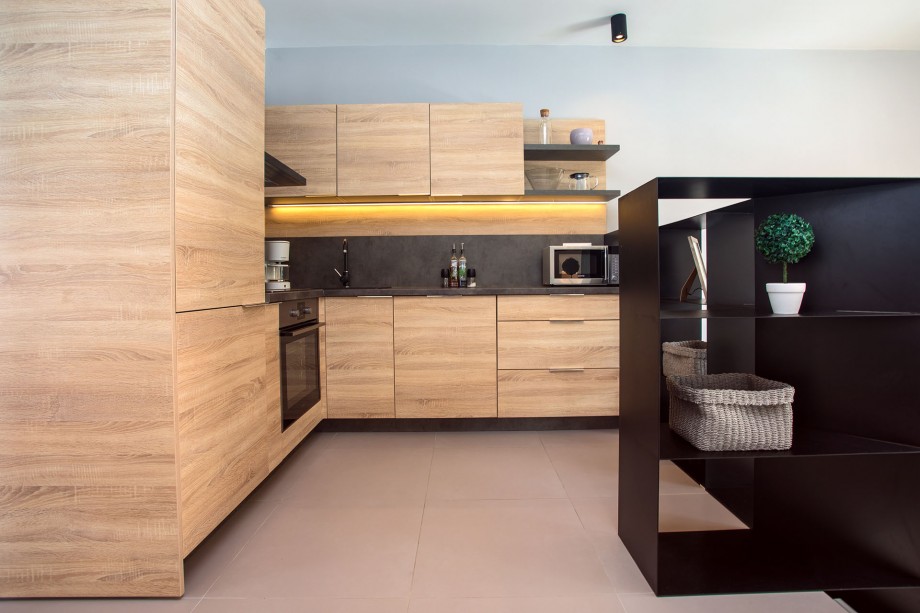 fully equipped kitchen next to the living area