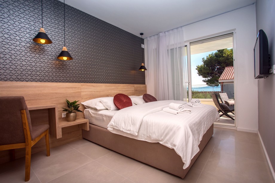 Bedroom No. 1 with double bed with en-suite and exit to terrace