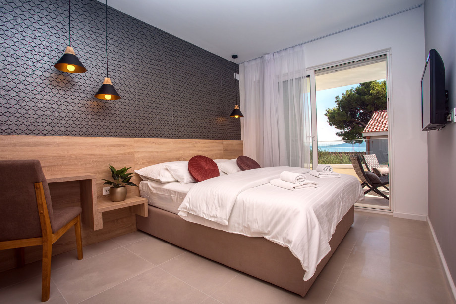 Bedroom No. 1 with double bed with en-suite and exit to terrace