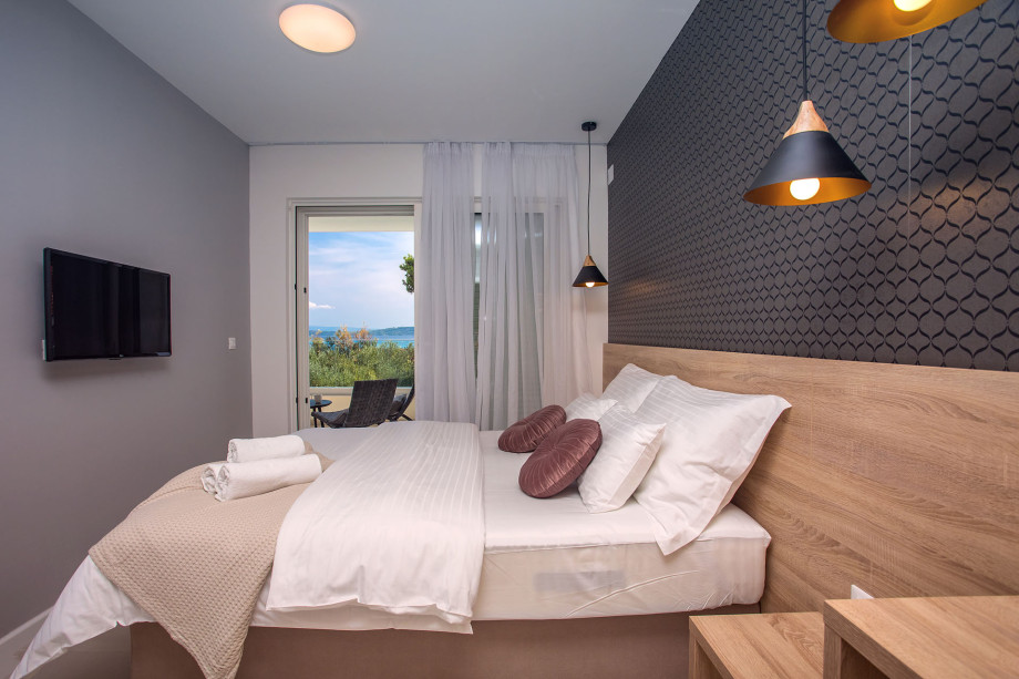 Bedroom No.5 with double bed with en-suite and exit to terrace