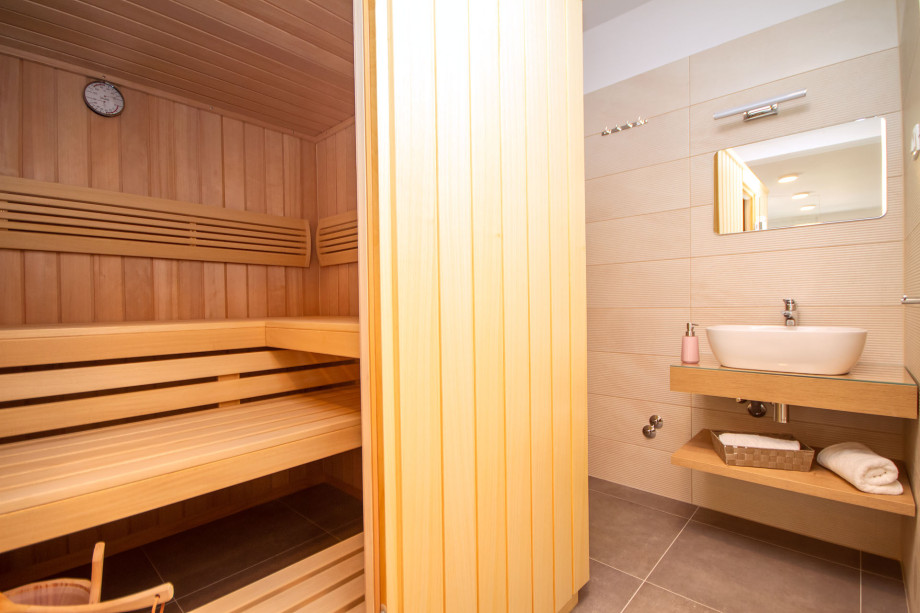 .Sauna place with free standing shower - on the ground floor