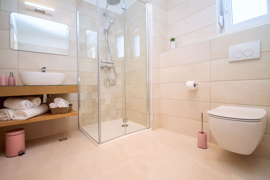 Ensuite bathroom with massage bathtub and shower in bedroom No.1