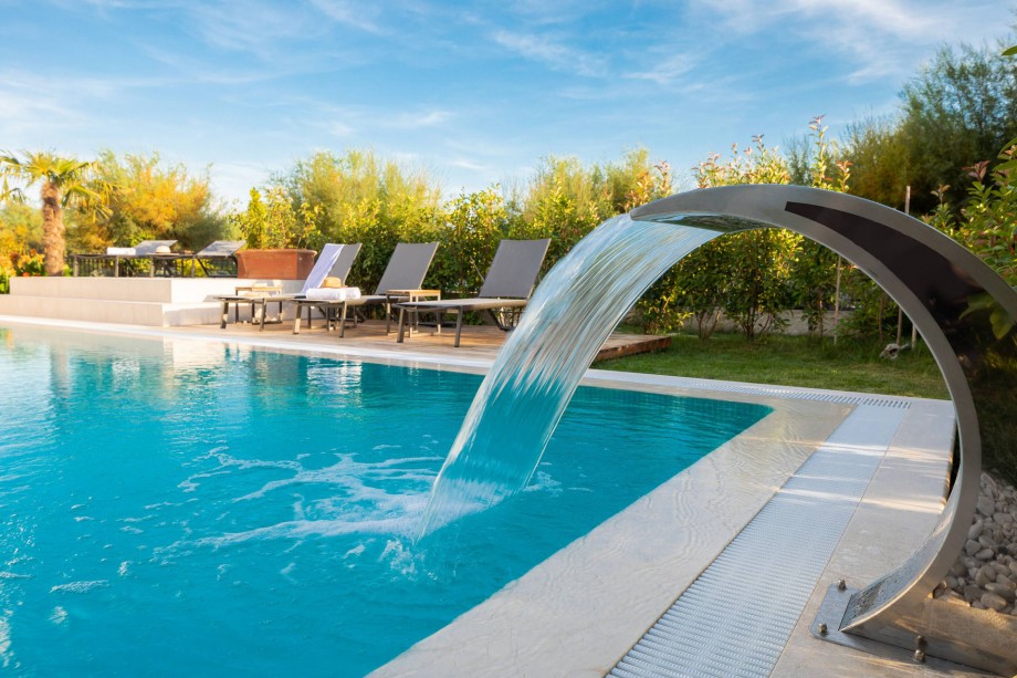 Sandy beach is just behind the fence, and still, the privacy at the property is guaranteed