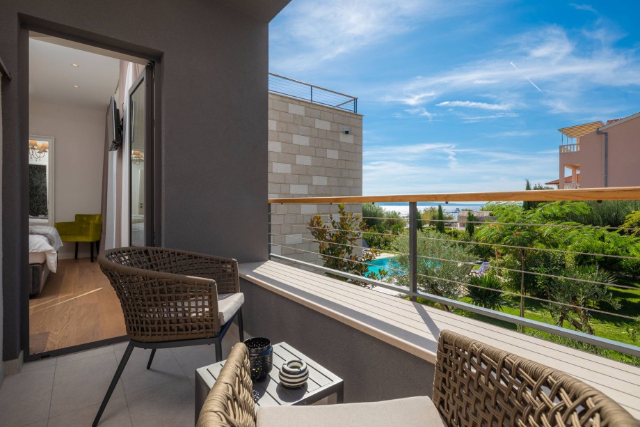 Terrace from Bedroom No2 with pool and garden views