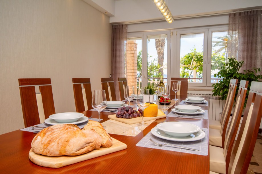 Comfortable dining and living area with direct exit to the outdoor dining area