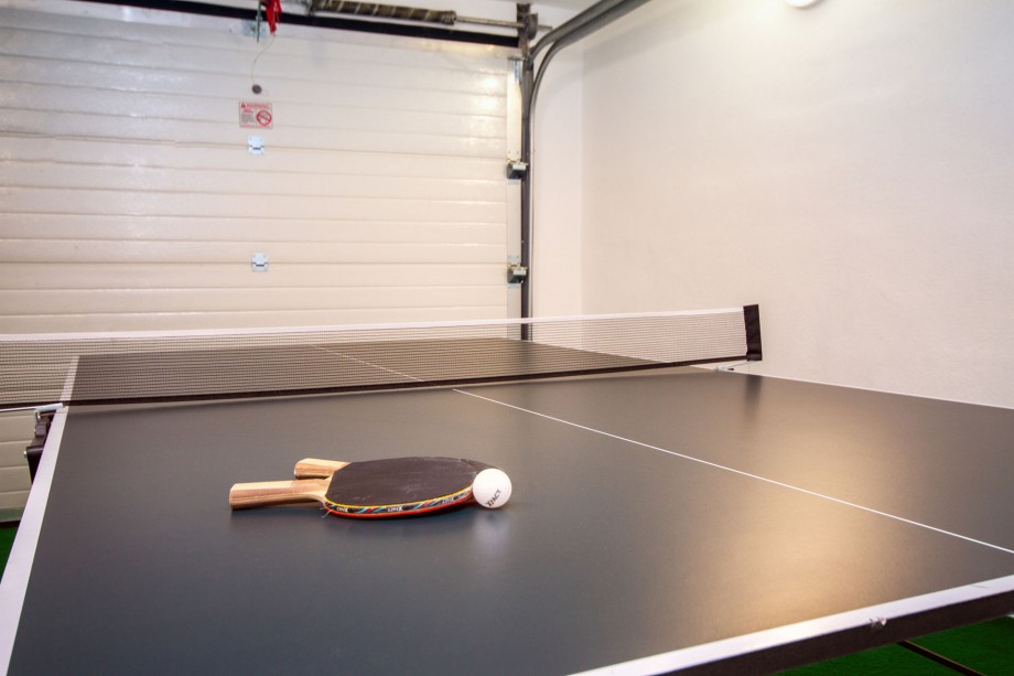 Table tennis in a garage at the parking area