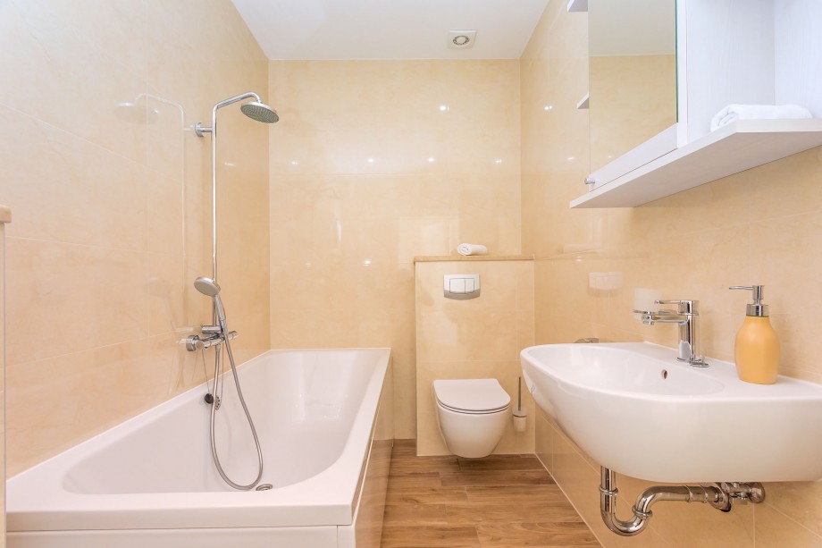 En-suite bathroom with a bathtub attached to Bedroom No1