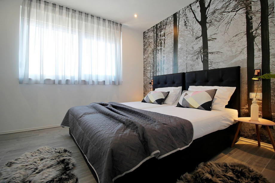 Bedroom on 1st floor with two single beds which can be connected