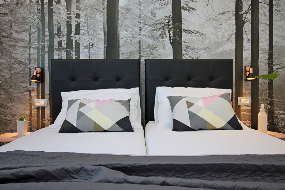 Bedroom on 1st floor with two single beds which can be connected