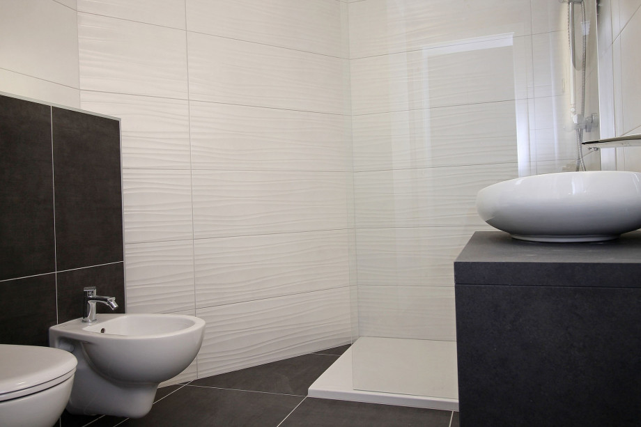 Family bathroom with a shower