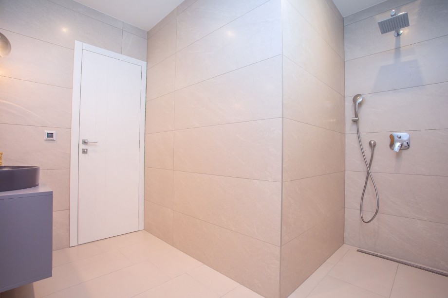 Family bathroom with shower on the ground floor