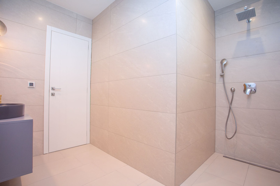 Family bathroom with shower on the ground floor