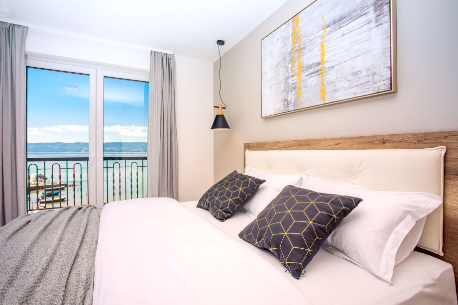 En-suite bedroom No.4 with king-size bed, exit to the balcony, TV, AC