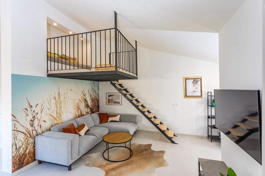 Spacious and modern living area with a great galery