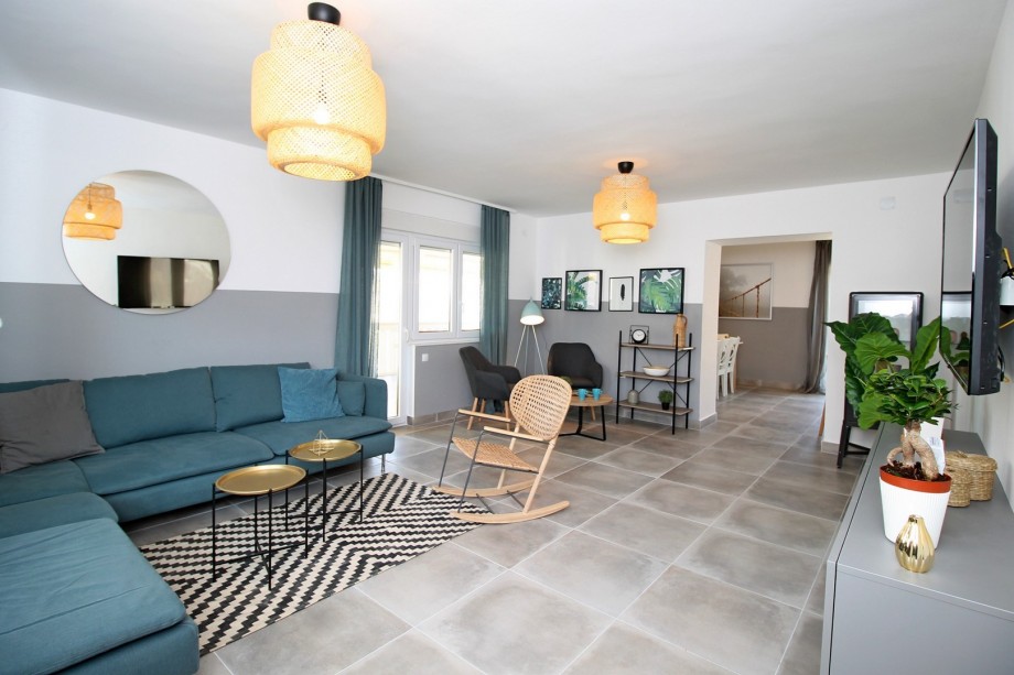 Spacious living and dining area with TV, WiFi, Air-con, exit to west terrace