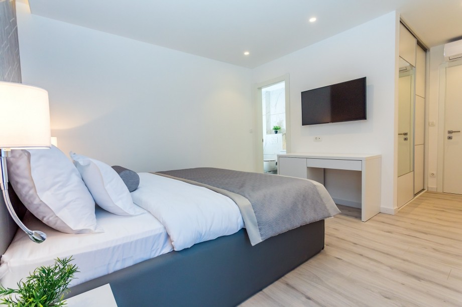 Bedroom No.1 has access to a terrace, TV, AC, a minibar