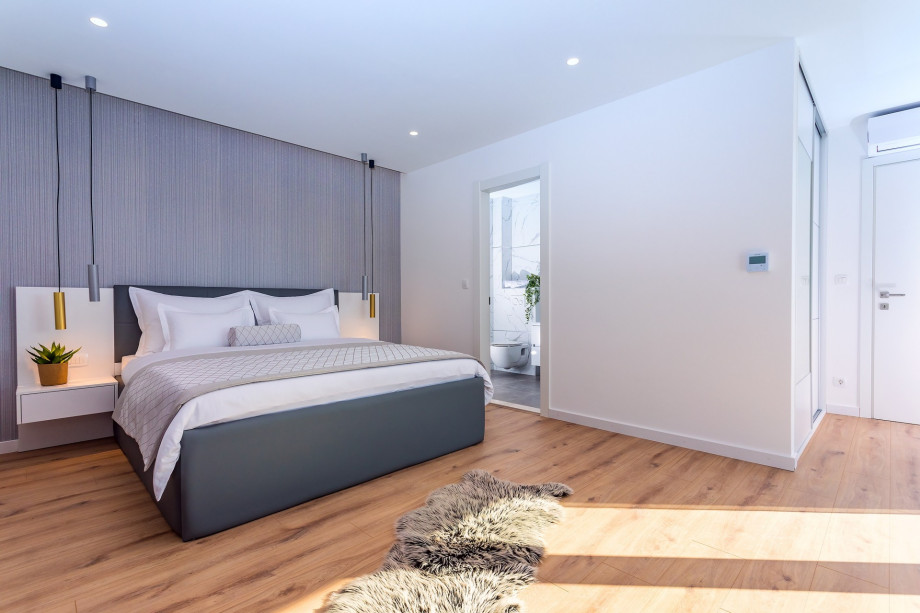 A Bedroom No.5 has access to a balcony with outdoor furniture