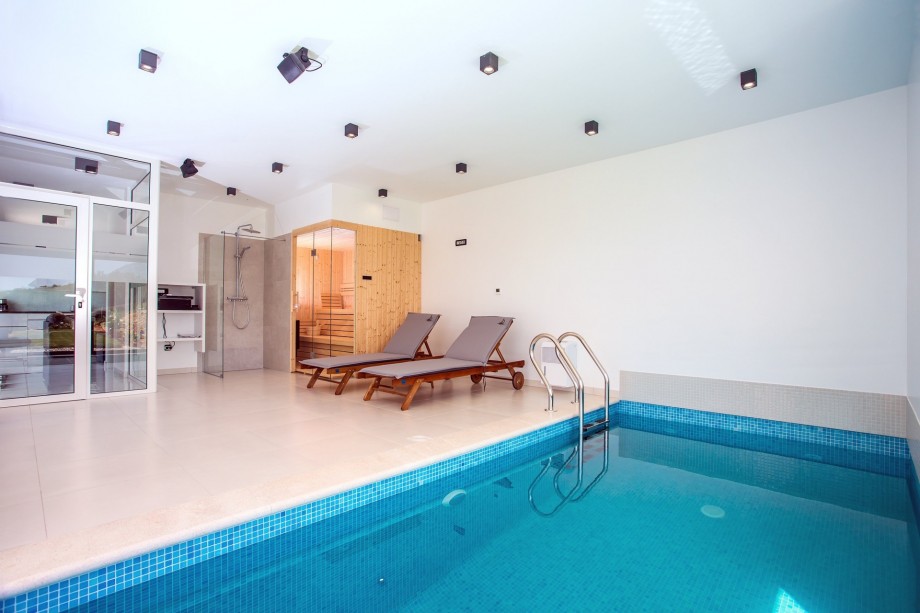 deck chairs for relaxing and a sauna next to it