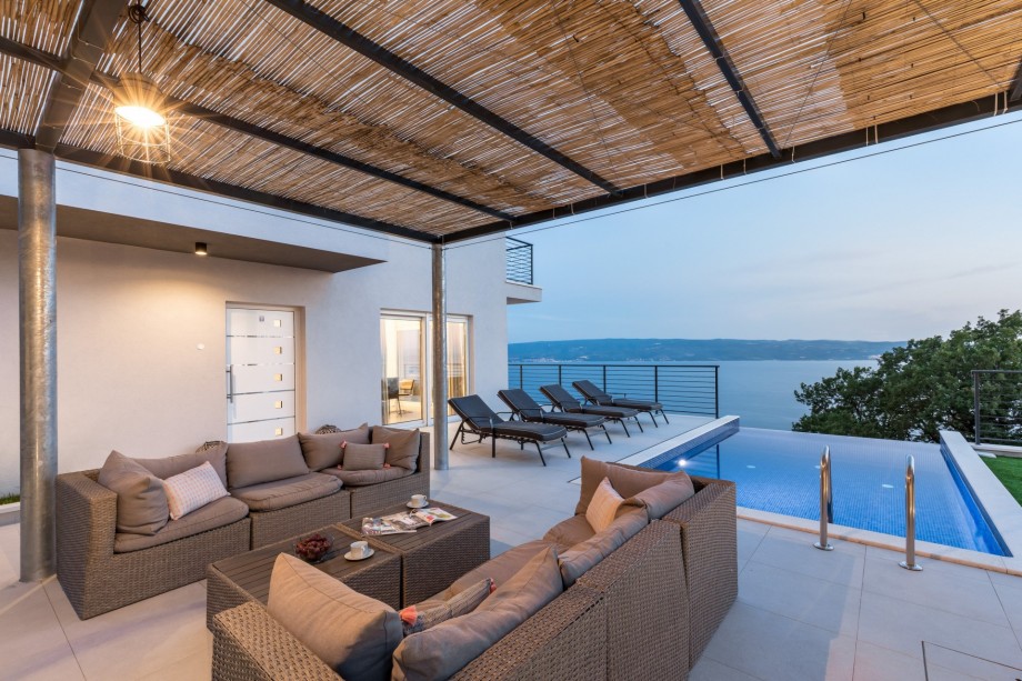 Enjoy in magical sunset from the pool area