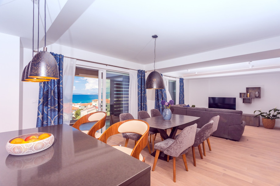 Glass walls on the first floor provide amazing sea views.