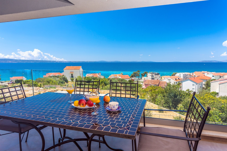 The covered terrace on the first floor with breathtaking Seaview