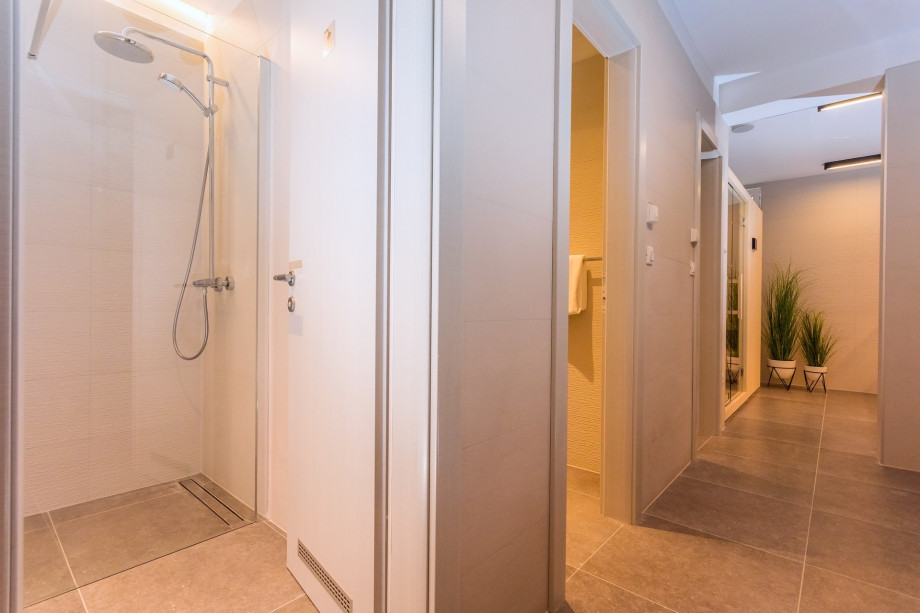 Two showers are next to the sauna (lower ground floor)