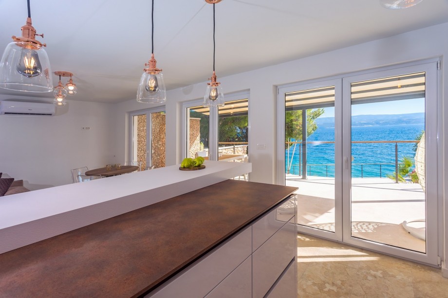 The ground floor level offers a well-equipped kitchen with all the appliances you need for a comfortable stay,