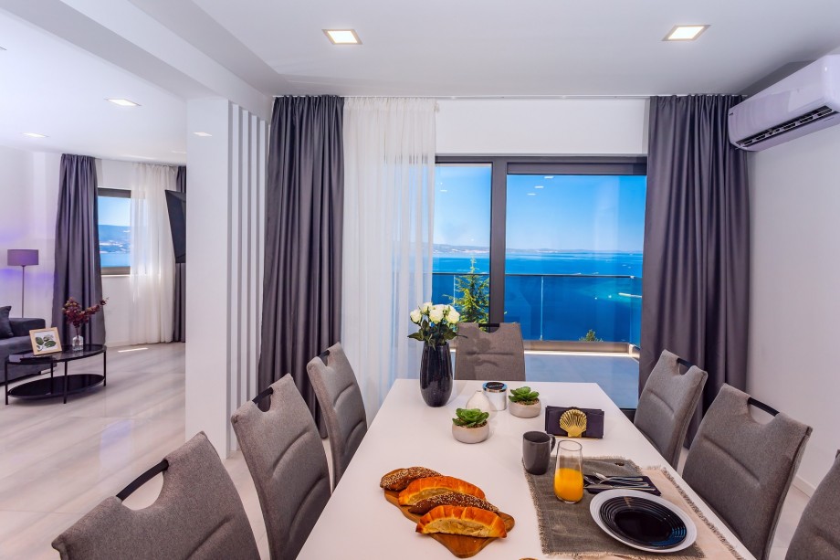 Glass walls provide amazing sea views.