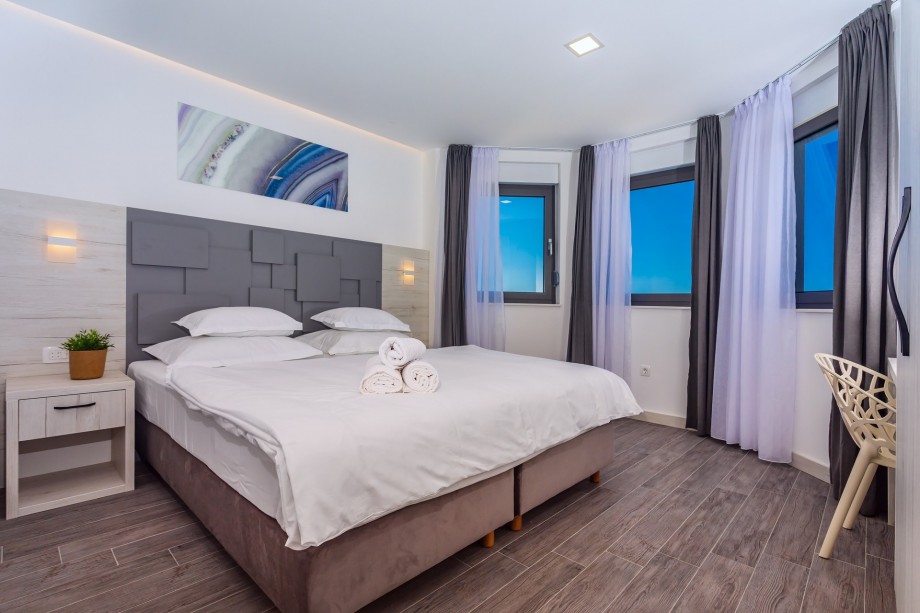 Bedroom No4 with king-size bed, TV, A/C, ensuite