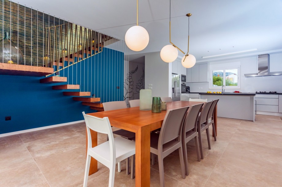 Dining room suitable for 10 persons with a fully equipped kitchen.