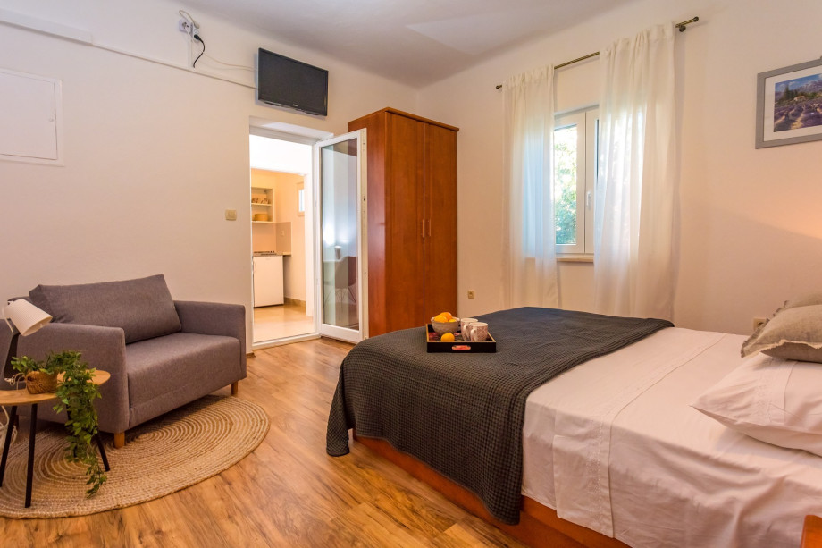 Bedroom No.3  with a balcony, and a kitchenette