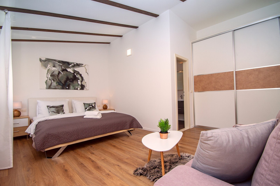 Bedroom NO1 with king size bed 180x200 ,a  sofa bed + exit to terrace, en-suite bathroom