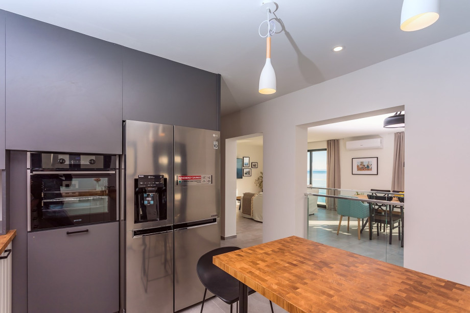 A well-equipped kitchen on the ground floor.