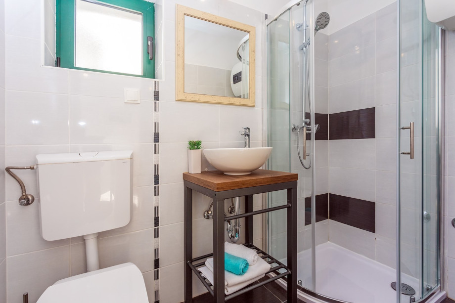 Family bathroom with a shower on the ground floor