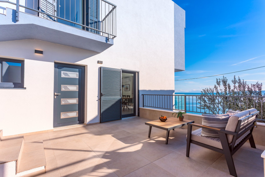A lounge area on the west side of the villa