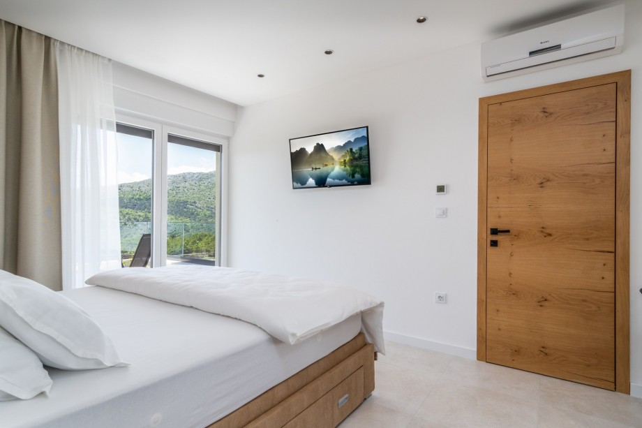 Bedroom No2 also offers a TV, and an A/C