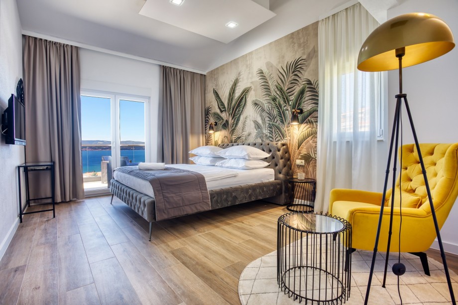 Bedroom No1 with double bed, TV, en-suite bathroom, and terrace