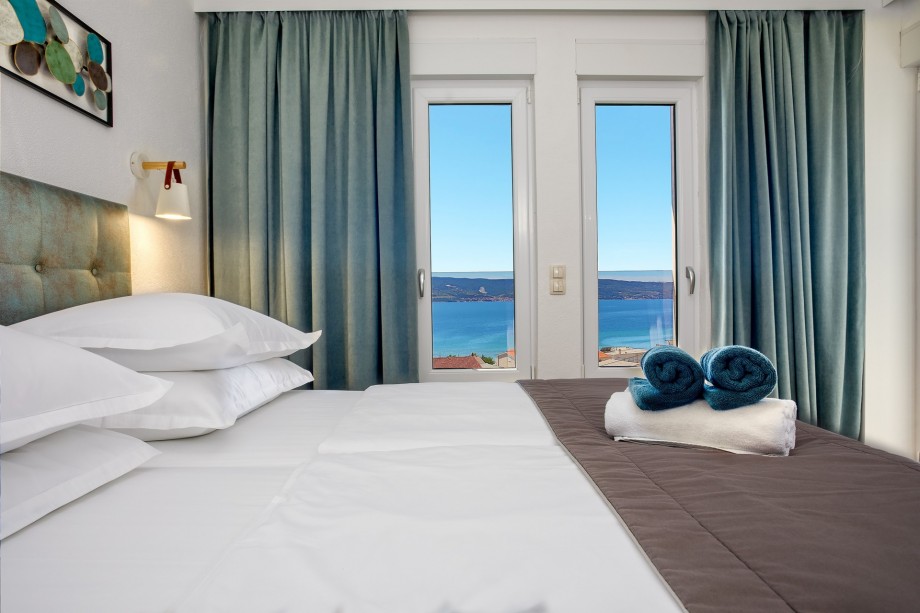 Bedroom No2 with 2 single beds (can connect to double) and exit to terrace