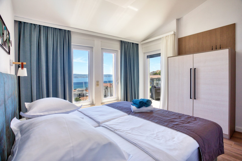 Bedroom No2 with 2 single beds (can connect to double) and exit to terrace