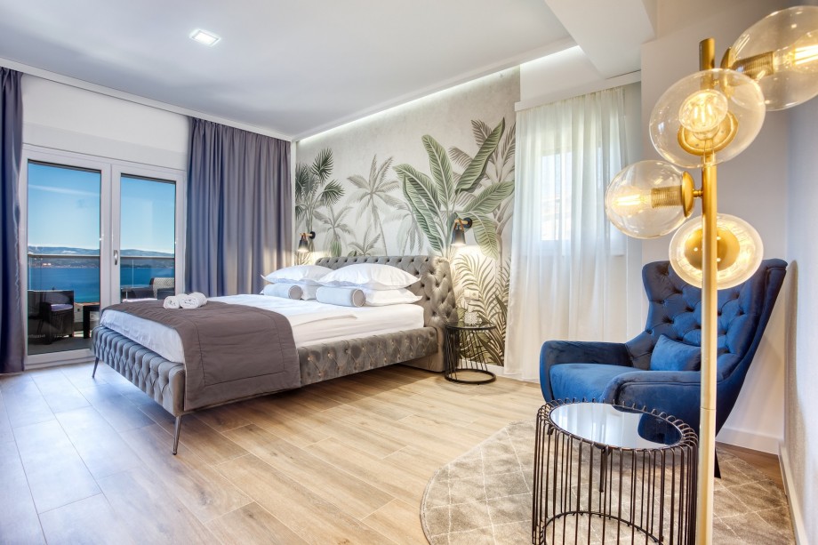 Bedroom No5 with double bed, en-suite bathroom, and terrace