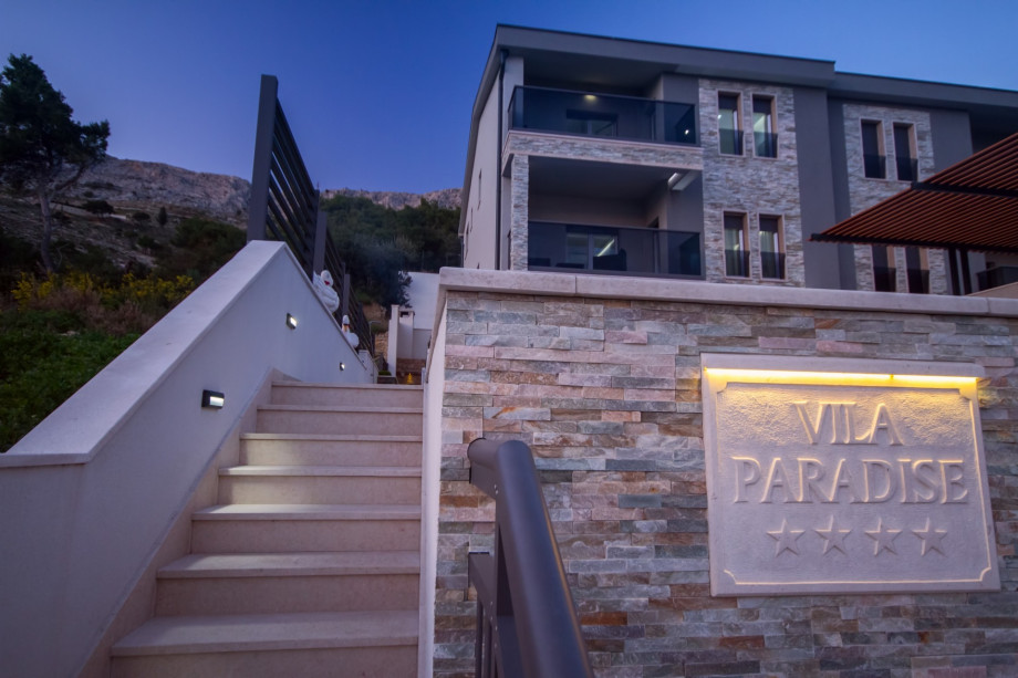 Entrance from the garage and parking area